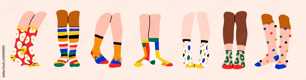 Set of seven pairs of female or male legs in the socks. Cool various prints. Stylish underwear. Fashion accessories. Footwear. Hand drawn vector colored trendy illustration. Flat design Set of seven pairs of female or male legs in the socks. Cool various prints. Stylish underwear. Fashion accessories. Footwear. Hand drawn vector colored trendy illustration. Flat design