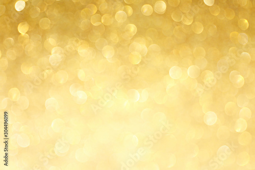 Photo Golden sparkle glitters with bokeh effect and selectieve focus