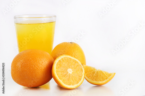 fresh orange fruit and ice with a white background