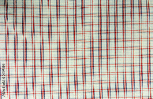 Pattern of a colored check on the material.
