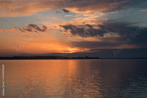 sunset over a lake © Lance
