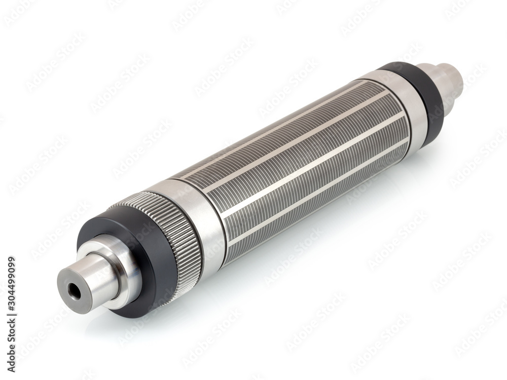 Magnetic cylinder for die cut on rotary printing press isolated on white background with shadow reflection. Cylinder for flexo rotary die cutting on in-line press machine with clipping path. Magnetic cylinder for die cut on rotary printing press isolated on white background with shadow reflection. Cylinder for flexo rotary die cutting on in-line press machine with clipping path.