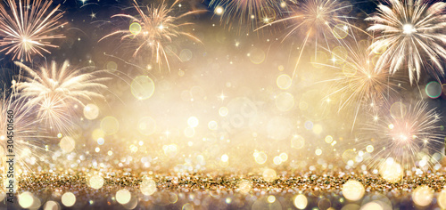 Obraz na plátně Golden Glitter Background With Fireworks In The Night