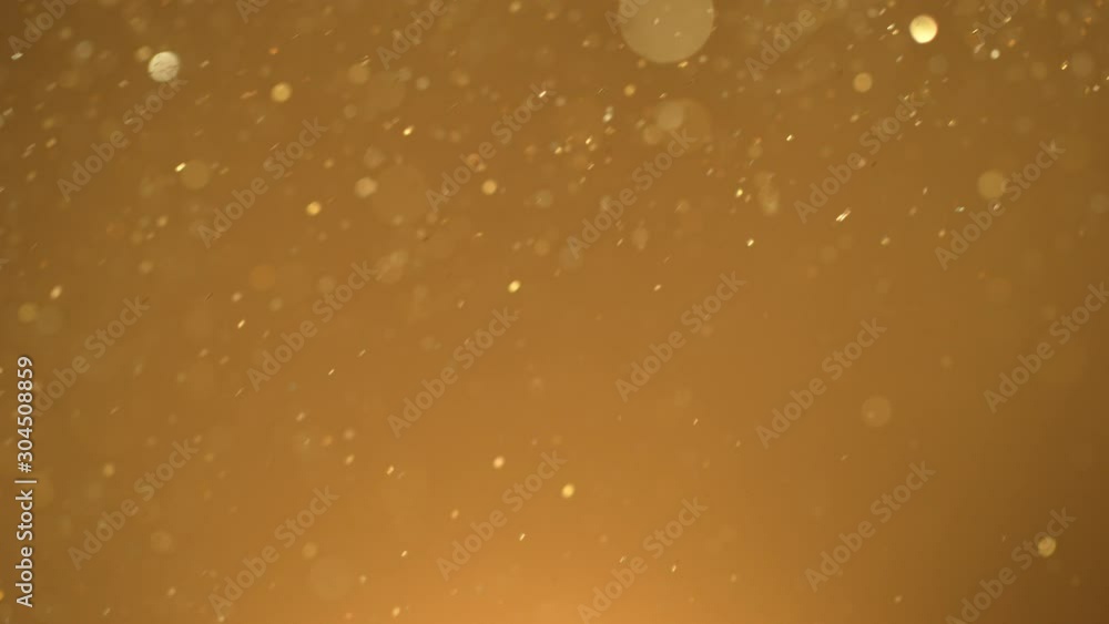 Golden Glitter Background in Super Slow Motion at 1000fps. Golden Glitter Background in Super Slow Motion at 1000fps.