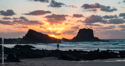 View of Zambujeira do Mar beach at sunset in Costa Vicentina, Portugal