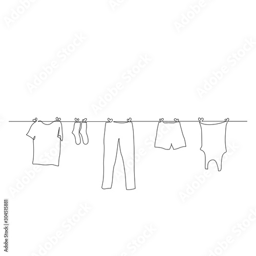 Continuous one line clothes dry on a rope. Vector illustration.
