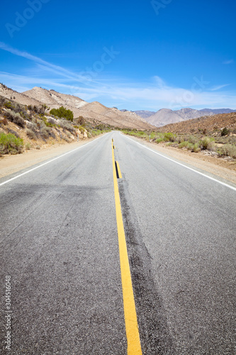 Scenic road in the Death Valley, focus on asphalt, USA.