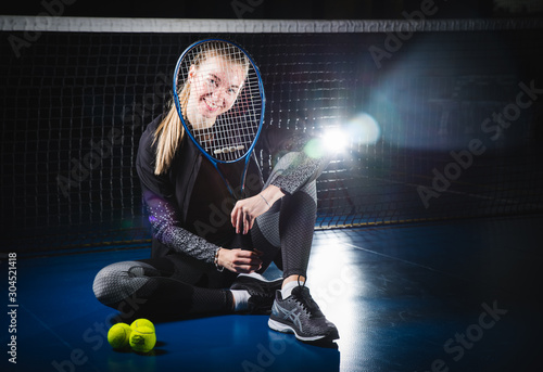 portrait of a tennis player with a racket