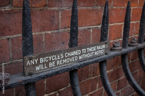 Sign on a urban fence in London.