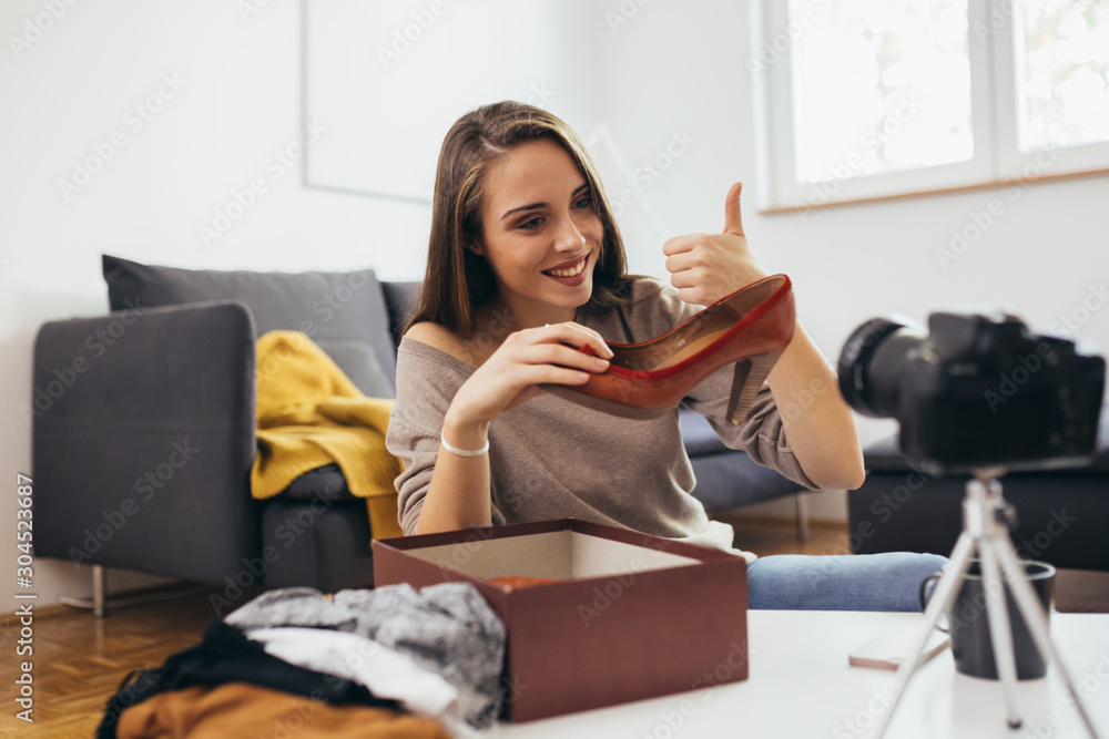 woman vlogger recording her new vlog about fashion. woman vlogger recording her new vlog about fashion.