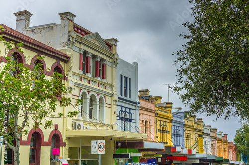 Colourful Victorian era houses in Glebe Point Road in Sydney, Australia.  photo