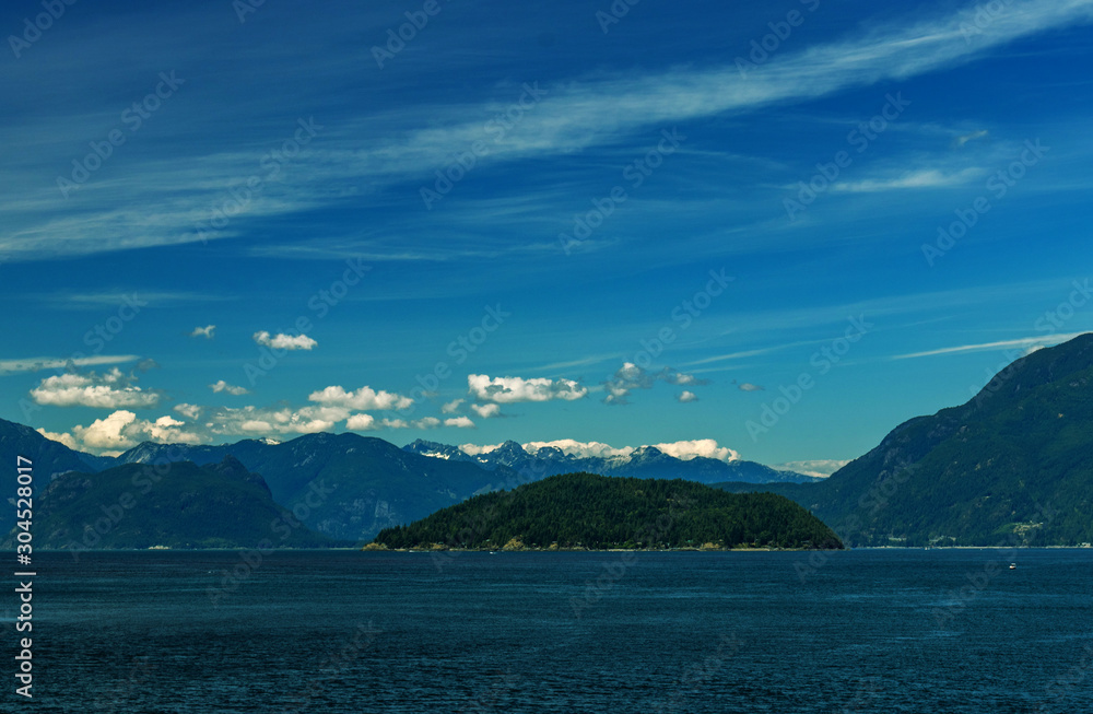 Islands, clouds, sea off the coast of BC, Canada Islands, clouds, sea off the coast of BC, Canada