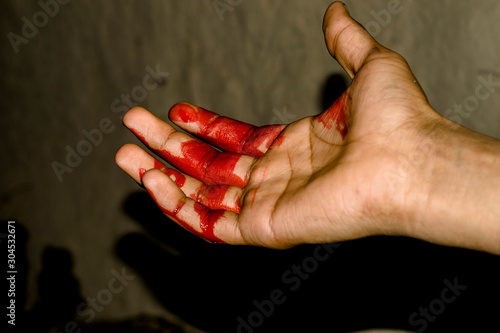 a badly bleeding hand and dark background Stock Photo | Adobe Stock a badly bleeding hand and dark background Stock Photo | Adobe Stock