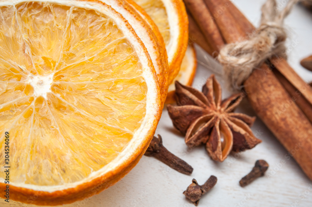 dried orange, anise, cinnamon, cloves – composition. on wooden background dried orange, anise, cinnamon, cloves – composition. on wooden background