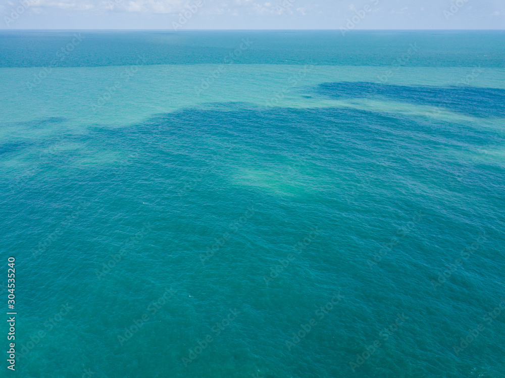 Aerial view of turquoise waves, water surface texture. Thailand Aerial view of turquoise waves, water surface texture. Thailand