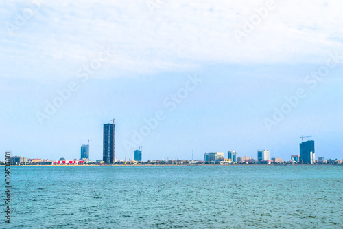 sea view and growing city in the background