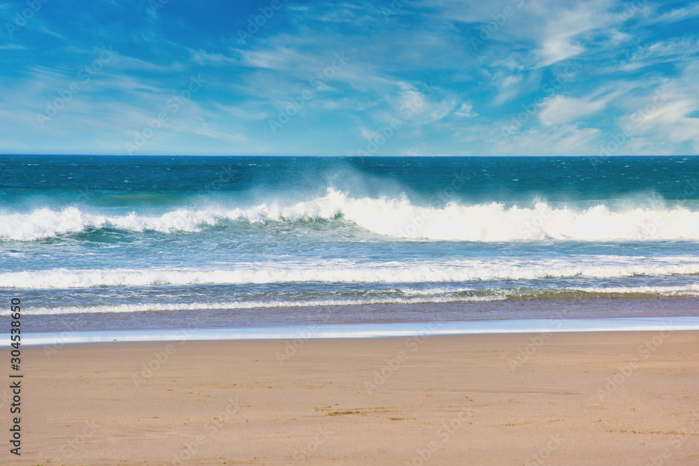 beach with waves of the Atlantic in front of Trebarwith Strand beach in North Cornwall, England beach with waves of the Atlantic in front of Trebarwith Strand beach in North Cornwall, England