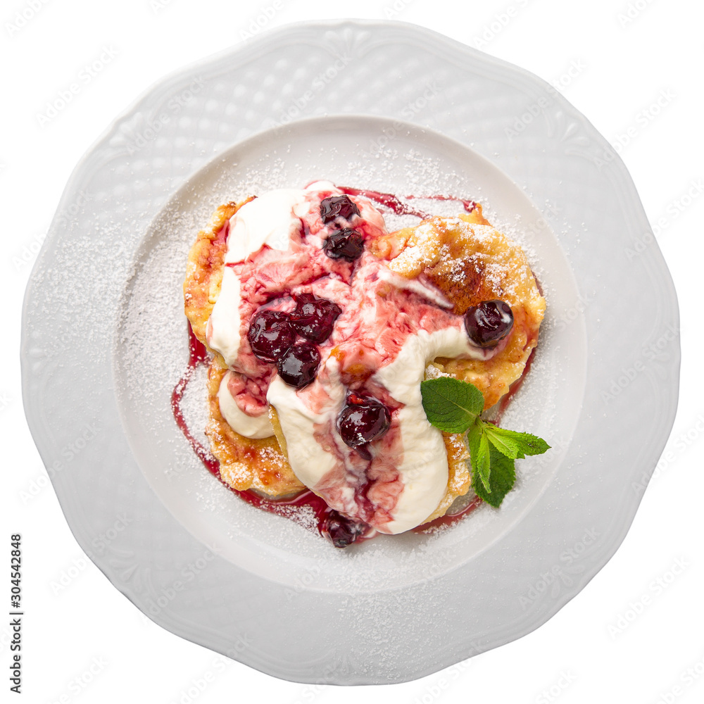 Breakfast pancakes with topping of meat, vegetables or berries. Gourmet restaurant menu. Isolated on white background. Flat lay top view Breakfast pancakes with topping of meat, vegetables or berries. Gourmet restaurant menu. Isolated on white background. Flat lay top view