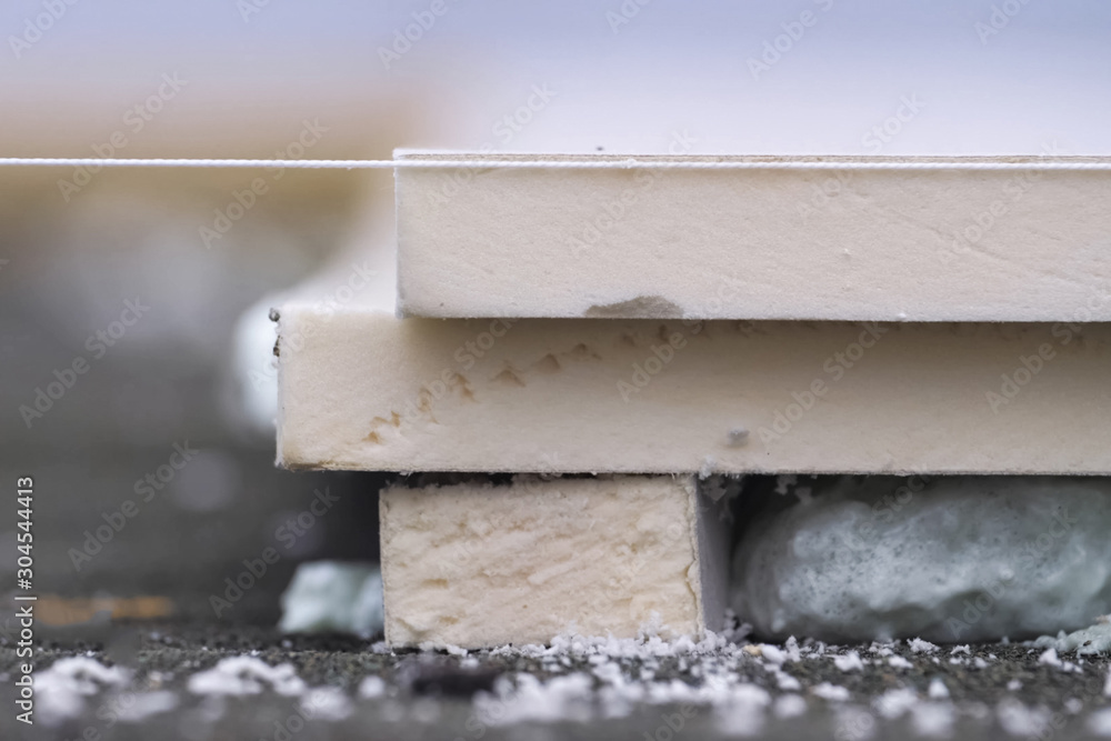 Roofing insulation, installation of insulation sheets on foam Roofing insulation, installation of insulation sheets on foam