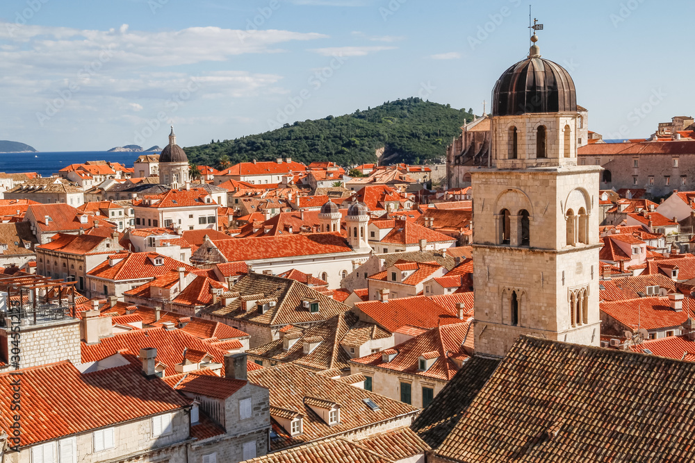 Church among red terra cotta tile roofs in the old town of Dubrovnik