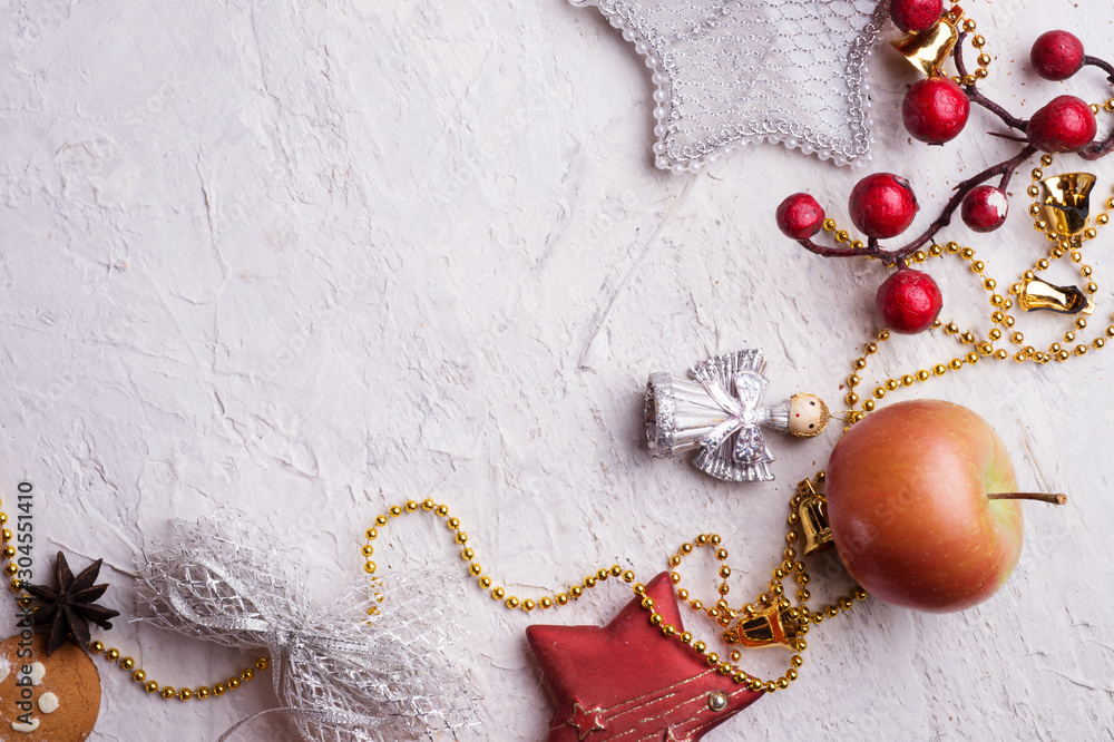 Naklejka premium jolly Christmas set with apple around white background. flat lay. close up