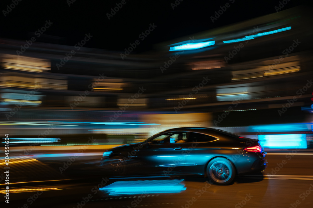 Monaco city night car traffic near Hotels and Casino