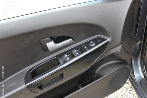 Control panel in the car door. © Ustun