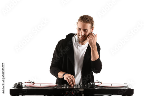 Male dj playing music on white background