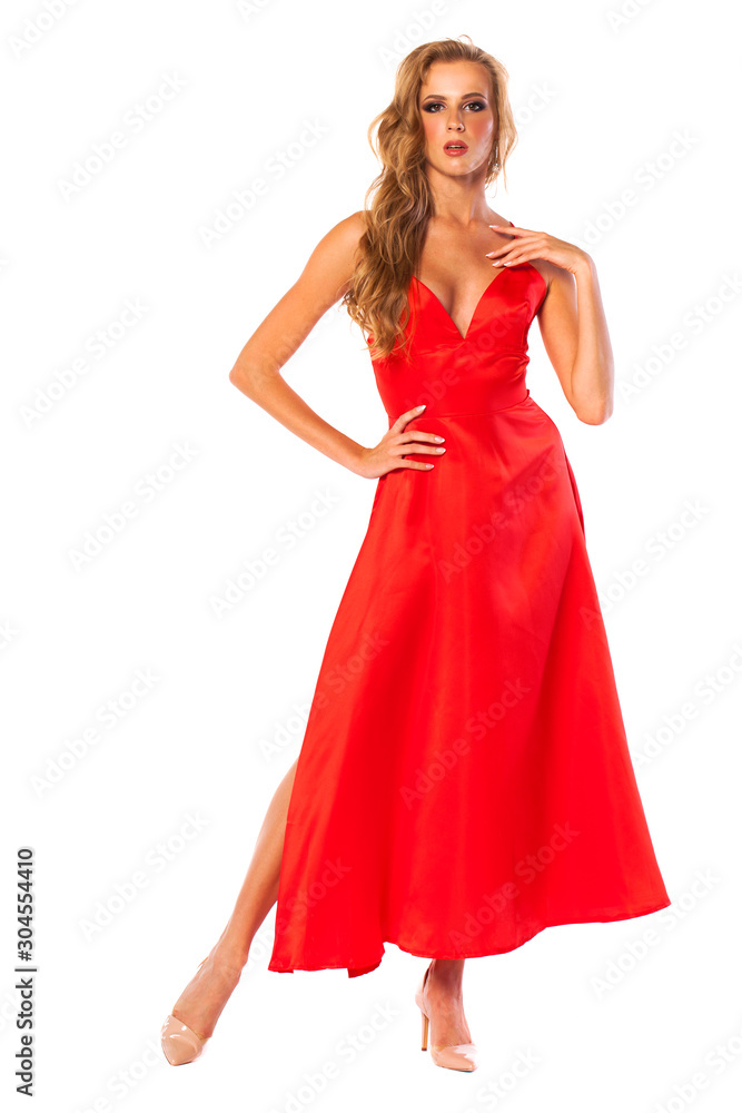 Young beautiful happy blonde woman in red dress