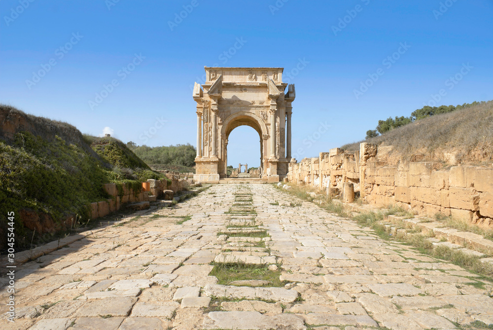 Leptis Magna, Libya. Roman Cobbled road leading to the Arch of Septimius Severus.