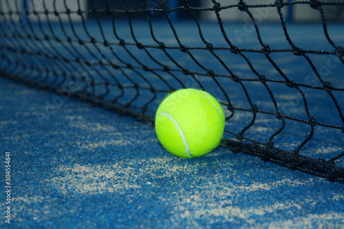 Tennis court with tennis ball close up © larisa