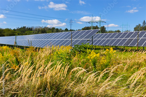 Obraz na płótnie Solar Power Station on the summer Meadow w salonie