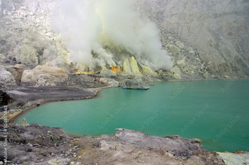 Crater lake in the Kawah Ijen volcano on the Java island in Indonesia