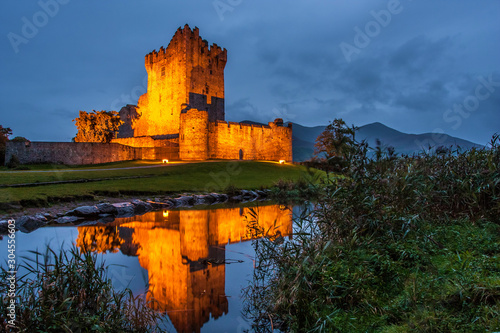 Ross Castle at dusk in Killarney, Ireland photo
