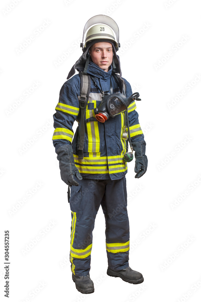 Young fireman with a mask and an air pack on his back Young fireman with a mask and an air pack on his back