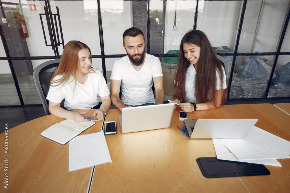 Students create a new project. Team working in a office Students create a new project. Team working in a office