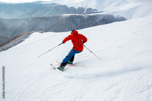 A skier is riding off piste.