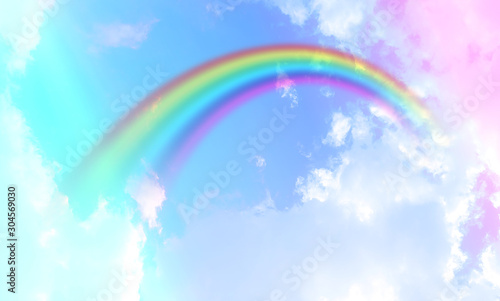 Rainbow background and sky with white clouds © Ping198