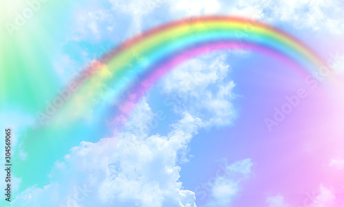 Rainbow background and sky with white clouds © Ping198