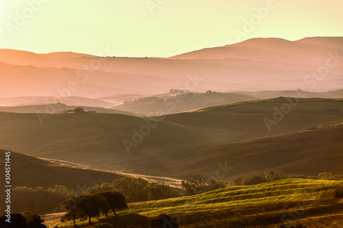 Tuscan hills at sunrise. Typical rural landscape. Tuscany  Italy