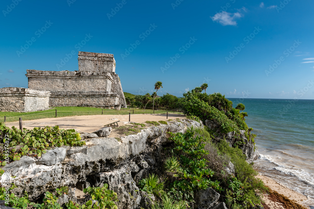Beautiful beach in Tulum Mexico, Mayan ruins on top of the cliff. Beautiful beach in Tulum Mexico, Mayan ruins on top of the cliff.