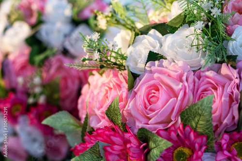 Beautiful artificial pink and white rose bouquet.