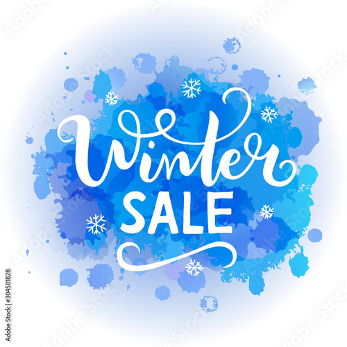 Vector illustration Winter sale on abstract spot watercolor background. Blue splashing isolated in the paper. Hand drawn lettering for postcard, sticker, banner. Bright blot for design and background