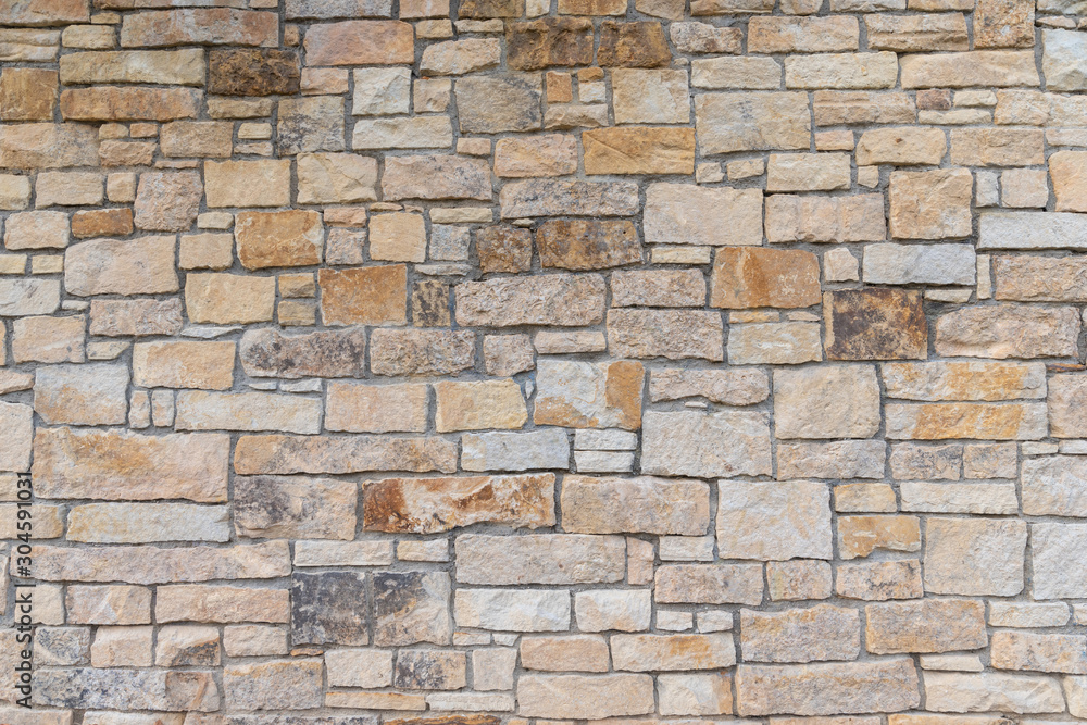 Ancient red stone wall flat background closeup