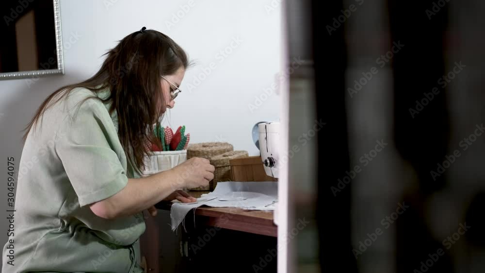 The woman is a designer. She produces the toys. The woman works in the garment factory. The woman is a designer. She produces the toys. The woman works in the garment factory.
