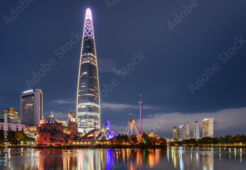 Amazing night view of skyscraper by lake at downtown, Seoul