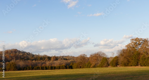 field, ridge, clouds, sky