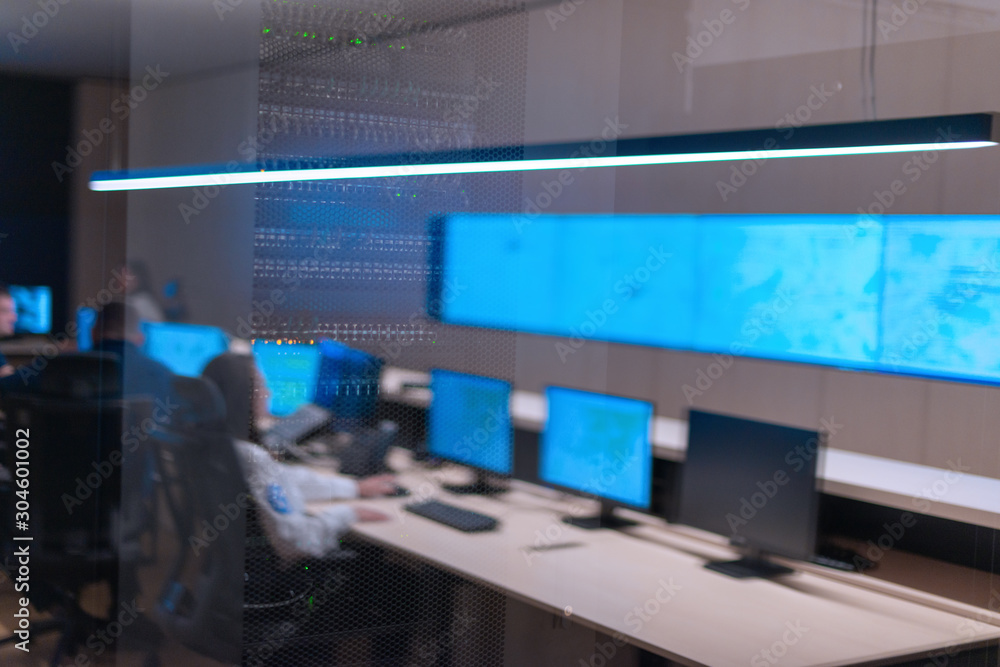 Reflection of a security agency team working at the data center Reflection of a security agency team working at the data center
