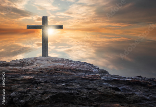Photography cross the crucifixion on the mountain jesus christ with a sunset background