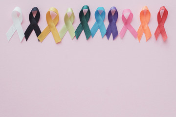 colorful ribbons on pink background, cancer awareness, World cancer day, Autism awareness
